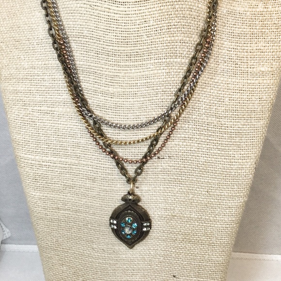 Jewelry - Four metal long pendent necklace